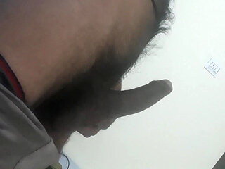 I shook my penis in the room and enjoyed caressing it lovingly