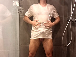 Striptease in the shower with wet white briefs and shirt