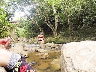 Unknown girl gives me a handjob in the river and cums on her big tits