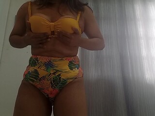 Schoolgirl in swimsuit wets her juicy pussy for the beach