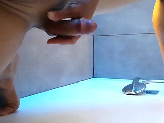 Tasty cock gets jacked off in the shower