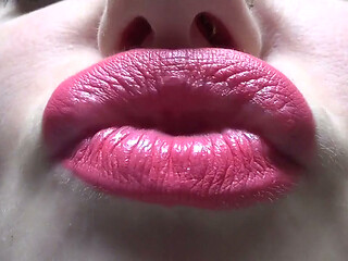 Kissing and duck face with big pink lips