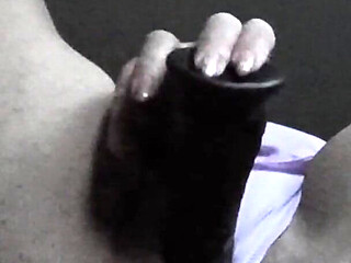 Mature Wife Arrives Home and Masturbates with Her Black Dildo.