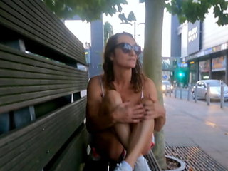 Slutty MILF was whipped in the street for public flashing