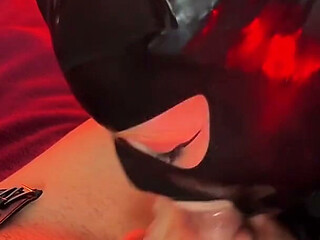 Naughty Doll Wearing a Latex Mask Gave Her Master Blowjob