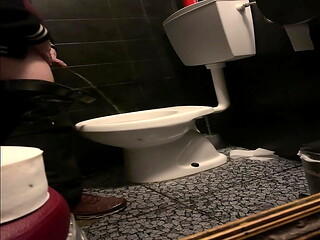 amateur guy caught pissing in a club'_s toilets