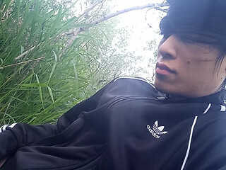 Gay boy Jon Arteen, wearing adidas tracksuit Campus sneakers, gets a hard-on outdoors, jerks off, squirts big cumshots before cl