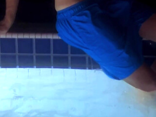 Hanging out in swimsuit at rooftop bar at night party