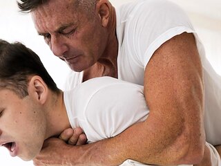 Suited DILF barebacks smooth twink