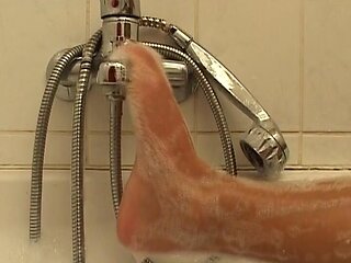 Big Boobed German Slut Enjoys Solo Action in the Shower