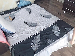 Sensual massage of a sexy couple with oil on the body. Foreplay in the bedroom with an amateur couple.