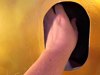 Huge thick cock shoots a massive load of cum at the golden gloryhole