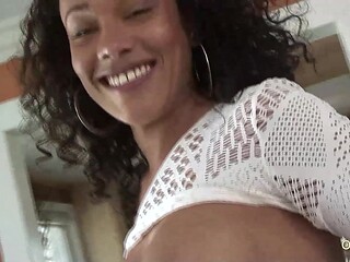 Black MILF gives a deepthroat blowjob to a big cracker cock