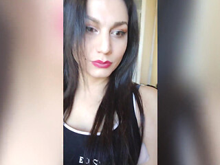 Nicole N Fantasy wearing a pink miniskirt and masturbating her cock and cum