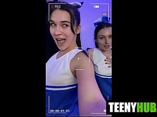 Petite teen gives a sloppy blowjob to her friend while another girl watches.
