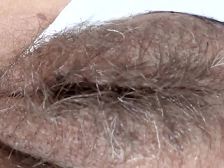 My stepson jerks off while watching my hairy pussy. He cums again and again. He wants to fuck me.