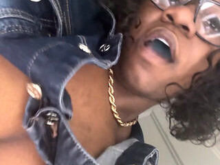 Big clit Ebony plays with a butt plug