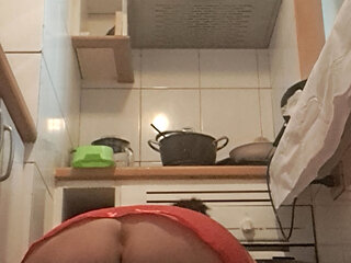 Mom cleaning the floor on her knees in red and black stockings