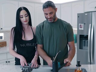 The busty housewife Violet Voss is caught in a steamy scene.