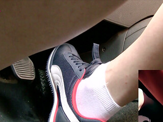 Driving in Blue Nike Sneakers and White Socks