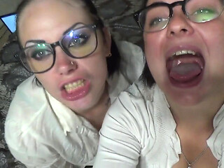 Two business women taunt you with their mouths & tongues before eating you whole!