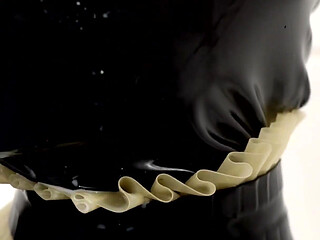 Rubber Slut Swallowing and Bathing in Milk
