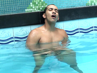 Latin dilf jerking off in the pool