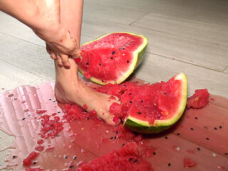 Busty MILF Presents Her Feet and Plays with a Watermelon