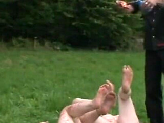 Dominating hanging pussy pinching in the park