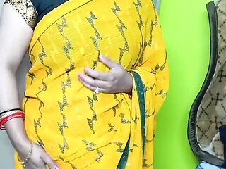 Beautiful bhabhi wearing yellow sari.