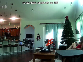 Camera catches MILF playing with pussy on couch