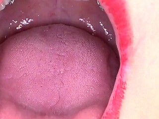 Mouth fetish video with Bara showing dental braces.