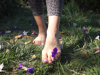 Crushing Flowers Barefoot In The Grass