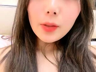 Amateur Asian teen sucks a big cock