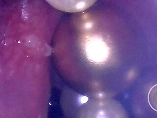 CAM INSIDE ASS: Ball Chain disappears deep in her hole