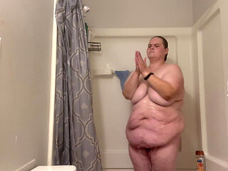 Fat bitch takes steaming hot shower and plays with herself