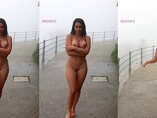 Enjoying the rain nude