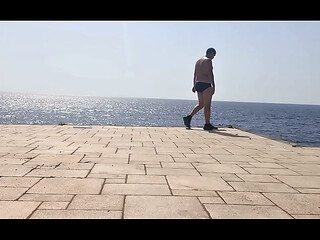 Naked in front of the sea
