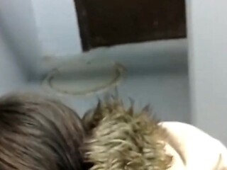 MILF gets a facial in the park bathroom
