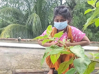 Bangladeshi babe exposes her juicy tits in a viral rooftop rain sex scandal.