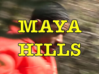 Maya Hills kneels in the kitchen and gives a deepthroat blowjob to her