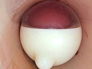 The camera in the deep pussy records a huge ejaculation of sperm into the condom