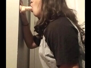 Sucking on dildo