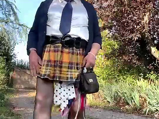 Dressed in a little yellow plaid skirt for a night out