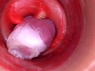 The camera inside the deep pussy records a huge ejaculation with a stuck condom!