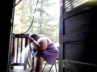 Showering in the water hose. pt 2