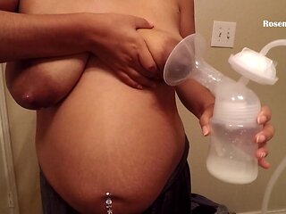 Pregnant MILF Breasts Milk Pumping