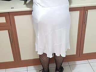 Sexy MILF in fishnet stockings and nightgown