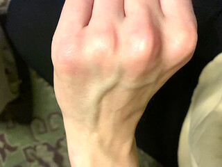Veiny Hands Near the Heater