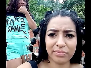 Two girls sit on a webcam, revealing their pretty pussies.